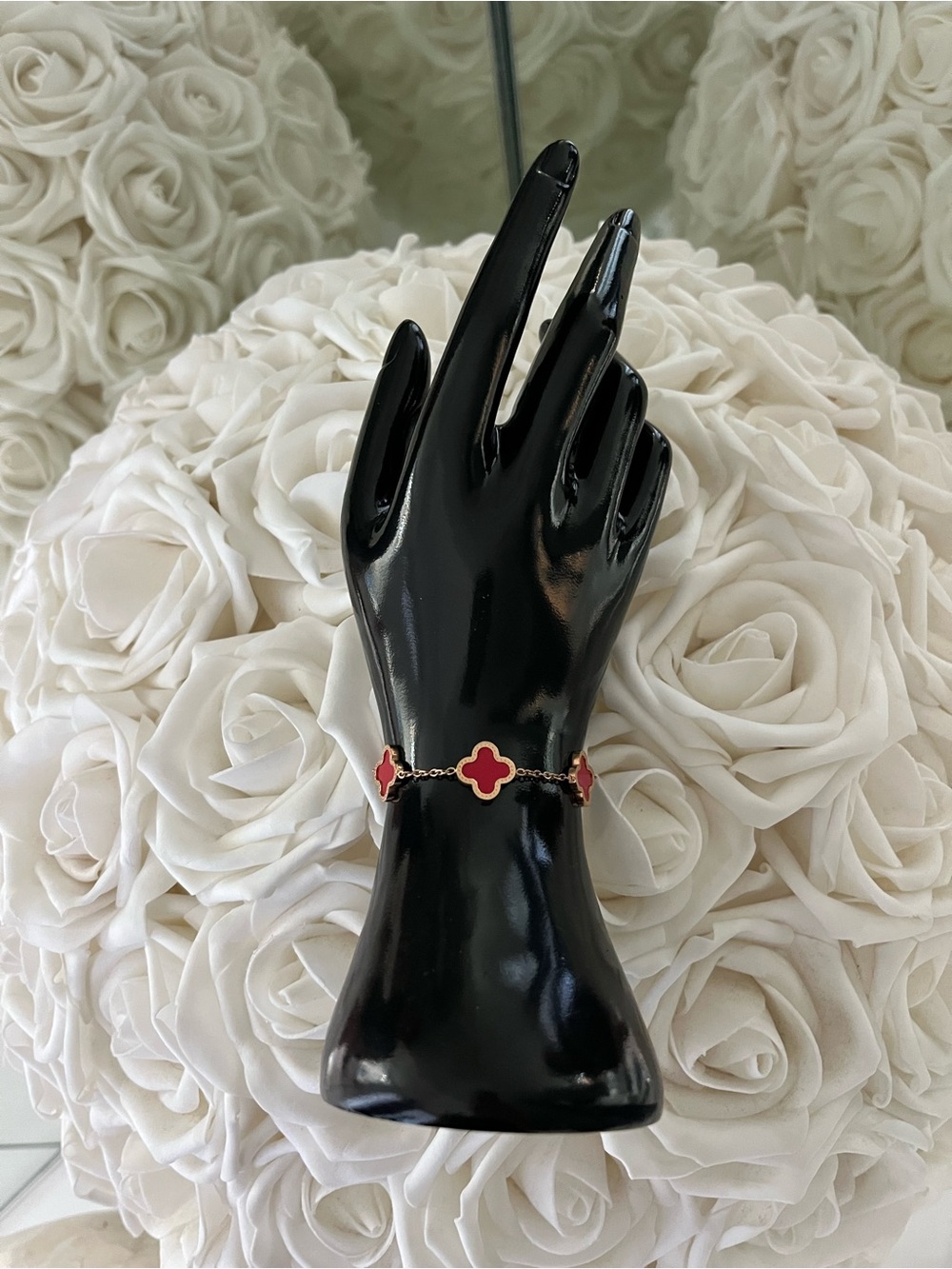 Red clover rose gold tone bracelet